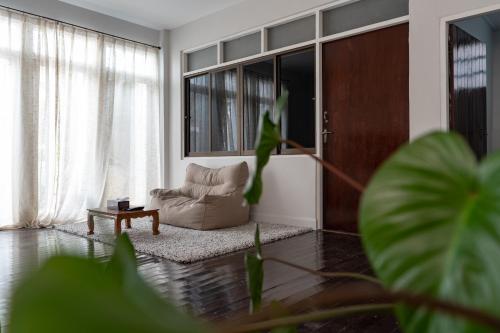 Shared lounge/TV area, 清迈古城柚子别墅塔佩门里 in Chiang Mai Shared lounge/TV area, 清迈古城柚子别墅塔佩门里 in Chiang Mai