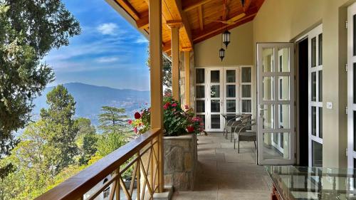 شرفة/ تراس, THE MAGNOLIA LODGE in المورا شرفة/ تراس, THE MAGNOLIA LODGE in المورا