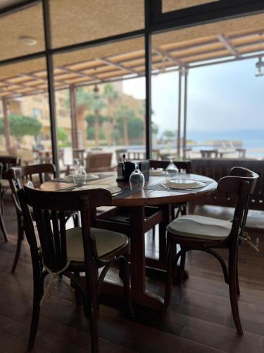 레스토랑, Apartment F35 - Samarah Resort in 소야이마 레스토랑, Apartment F35 - Samarah Resort in 소야이마