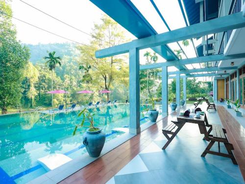 Aramya river front boutique hotel in 키툴가라 Aramya river front boutique hotel in 키툴가라