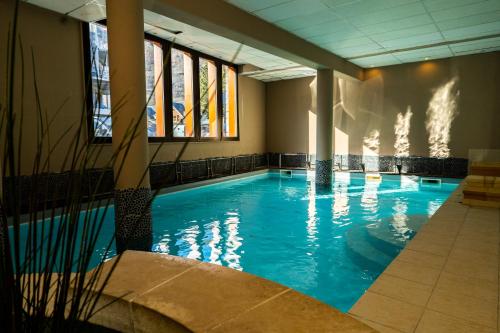 Úszómedence, Apparts au Cœur de St-Lary - Piscine Chauffée et Sauna (Apparts au Cœur de St-Lary - Piscine Chauffee et Sauna) in Saint-Lary-Soulan Úszómedence, Apparts au Cœur de St-Lary - Piscine Chauffée et Sauna (Apparts au Cœur de St-Lary - Piscine Chauffee et Sauna) in Saint-Lary-Soulan