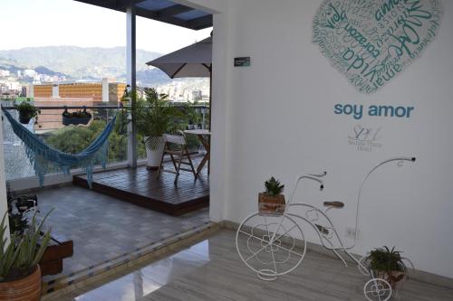 Terraza/balcón, Hotel Sixtina Plaza Medellin in Medellín Terraza/balcón, Hotel Sixtina Plaza Medellin in Medellín