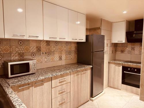 dapur, Penthouse cosy avec piscine privée (Penthouse cosy avec piscine privee) in Gammarth dapur, Penthouse cosy avec piscine privée (Penthouse cosy avec piscine privee) in Gammarth