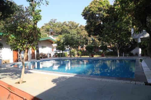 Úszómedence, Corbett Paradiso Resorts in Korbett Úszómedence, Corbett Paradiso Resorts in Korbett