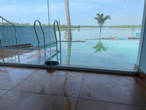 Swimming pool, Blue Lagoon Homestay in Suratakal Swimming pool, Blue Lagoon Homestay in Suratakal