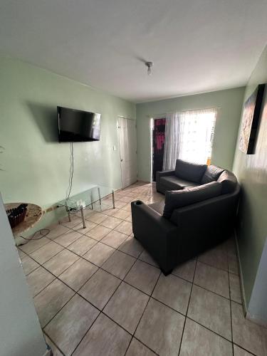 Shared lounge/TV area, casa naguera in Nagua Shared lounge/TV area, casa naguera in Nagua