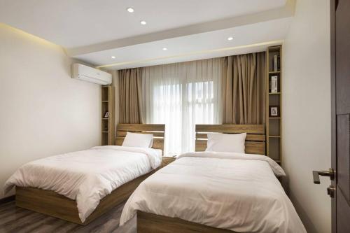 Madinaty 2BR - The Orange Butterfly