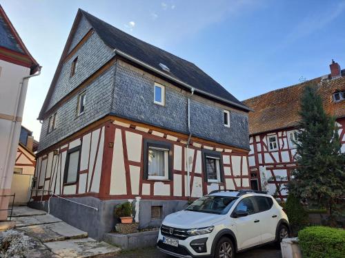 A szálláshely kívülről, Privatzimmer mit eigenem Bad und Blick auf den Rhein in Osterspai A szálláshely kívülről, Privatzimmer mit eigenem Bad und Blick auf den Rhein in Osterspai