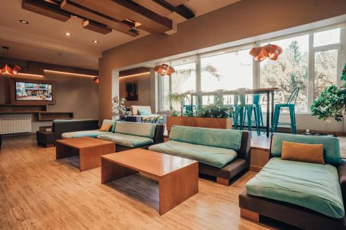 공용 라운지/TV 시청 구역, Hotel EcoSki by bund in 산 카를로스 데 바릴로체 공용 라운지/TV 시청 구역, Hotel EcoSki by bund in 산 카를로스 데 바릴로체