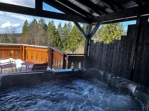 Chalet avec jacuzzi privé, vue sur les Vosges (Chalet avec jacuzzi prive, vue sur les Vosges) in 貝爾費伊 Chalet avec jacuzzi privé, vue sur les Vosges (Chalet avec jacuzzi prive, vue sur les Vosges) in 貝爾費伊