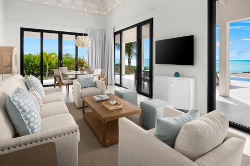 Ambergris Cay Private Island All Inclusive - PLS Island Hopper Flight Included in Гранд-Терк Ambergris Cay Private Island All Inclusive - PLS Island Hopper Flight Included in Гранд-Терк