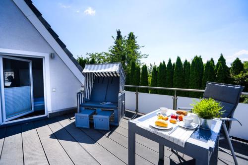 Ferienhaus Auszeit - Wohnung "Salzbrise" in Gromitz Town Center Ferienhaus Auszeit - Wohnung "Salzbrise" in Gromitz Town Center