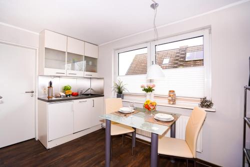 Ferienhaus Auszeit - Wohnung "Salzbrise" in Gromitz Town Center Ferienhaus Auszeit - Wohnung "Salzbrise" in Gromitz Town Center