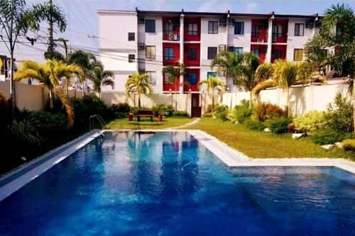 Swimming pool, Romantic 2BR Condo unit with free WiFi in Imus Swimming pool, Romantic 2BR Condo unit with free WiFi in Imus
