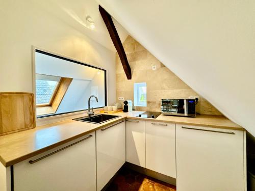 Facilities, Le Loft - By BEST KEYS - Prestige - Vue Cathedrale - Poutres Apparentes - Baignoire Ilot - Centre Vi in Sens Facilities, Le Loft - By BEST KEYS - Prestige - Vue Cathedrale - Poutres Apparentes - Baignoire Ilot - Centre Vi in Sens