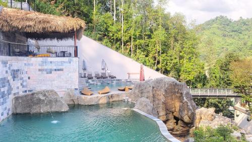Swimming pool, Lotus Premium Lodge - Lotus Group Tours in Ha Giang Swimming pool, Lotus Premium Lodge - Lotus Group Tours in Ha Giang
