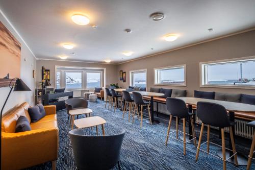Shared lounge/TV area, HOTEL SØMA Aasiaat in Aasiaat Shared lounge/TV area, HOTEL SØMA Aasiaat in Aasiaat