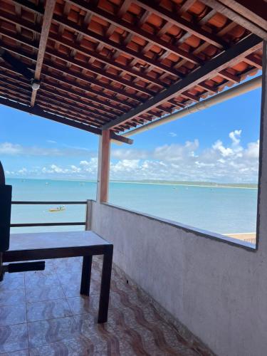 Erkély/terasz, Cantinho do Eden - Pontal de Coruripe - em frente a praia com garage privativo in Coruripe Erkély/terasz, Cantinho do Eden - Pontal de Coruripe - em frente a praia com garage privativo in Coruripe