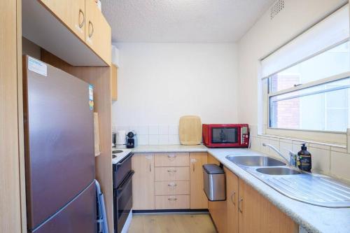 Kitchen, 2 Bedroom Water Views Edgecliff Harbour Apartment in Double Bay Kitchen, 2 Bedroom Water Views Edgecliff Harbour Apartment in Double Bay