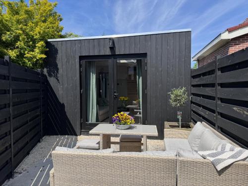 ระเบียง/ชานเรือน, Modern guest house. in บูนเดอร์มาร์เกอร์ ระเบียง/ชานเรือน, Modern guest house. in บูนเดอร์มาร์เกอร์