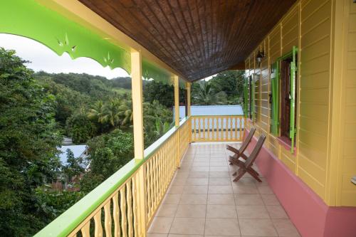 Terraza/balcón, Le gîte du jardin (Le gite du jardin) in Gros-Morne Terraza/balcón, Le gîte du jardin (Le gite du jardin) in Gros-Morne