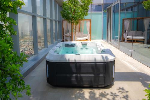 Swimming pool, The First Collection at Jumeirah Village Circle, a Tribute Portfolio Hotel in Dubailand Swimming pool, The First Collection at Jumeirah Village Circle, a Tribute Portfolio Hotel in Dubailand