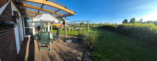 Kert, Ferienwohnung Schipper Nordsee in Neuschoo Kert, Ferienwohnung Schipper Nordsee in Neuschoo