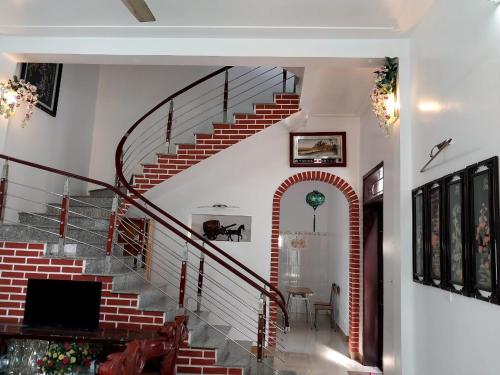 صالة مشتركة/ منطقة التلفزيون, Nha Xanh Homestay in نينه بينه صالة مشتركة/ منطقة التلفزيون, Nha Xanh Homestay in نينه بينه