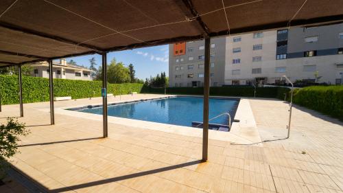 Úszómedence, Apartamento Alhambra a 8 minutos Granada, con Parking y Piscina in Alhendin Úszómedence, Apartamento Alhambra a 8 minutos Granada, con Parking y Piscina in Alhendin