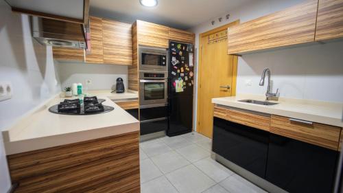 Konyha, Apartamento Alhambra a 8 minutos Granada, con Parking y Piscina in Alhendin Konyha, Apartamento Alhambra a 8 minutos Granada, con Parking y Piscina in Alhendin