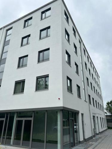 Зовнішній вигляд готелю, Munique Hotel München (Munique Hotel Munchen) in Unterschleissheim Зовнішній вигляд готелю, Munique Hotel München (Munique Hotel Munchen) in Unterschleissheim