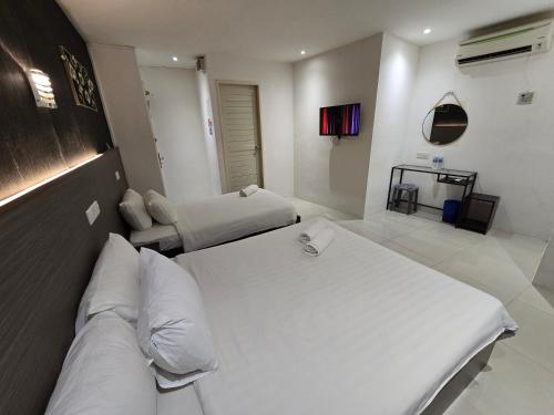 โรงแรมวัน พอยต์ แอท อาร์เอช พลาซา (One Point Hotel @ RH Plaza) in กูชิง โรงแรมวัน พอยต์ แอท อาร์เอช พลาซา (One Point Hotel @ RH Plaza) in กูชิง