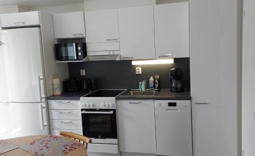 Kitchen, Lomayksio C 2 Sotkamon keskustassa in Sotkamo Kitchen, Lomayksio C 2 Sotkamon keskustassa in Sotkamo