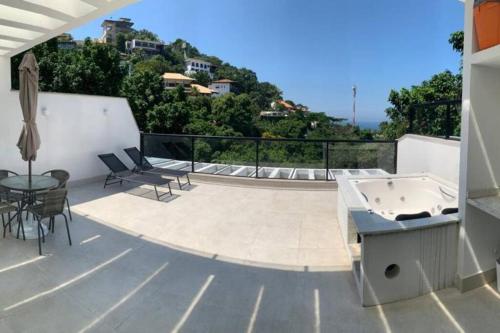 ระเบียง/ชานเรือน, Lindo e aconchegante apartamento na Joatinga in เชาติงกา ระเบียง/ชานเรือน, Lindo e aconchegante apartamento na Joatinga in เชาติงกา