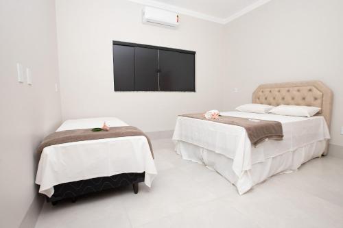Refúgio de Luxo: 4 Suítes, Piscina, Acesso ao Lago (Refugio de Luxo: 4 Suites, Piscina, Acesso ao Lago) in 파르케 테르마스 지 칼다스 Refúgio de Luxo: 4 Suítes, Piscina, Acesso ao Lago (Refugio de Luxo: 4 Suites, Piscina, Acesso ao Lago) in 파르케 테르마스 지 칼다스