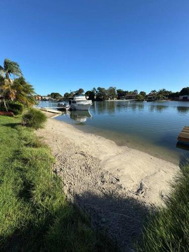 House and Van on the River