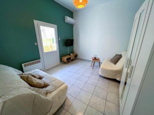 Cosy studio rez de jardin climatisé