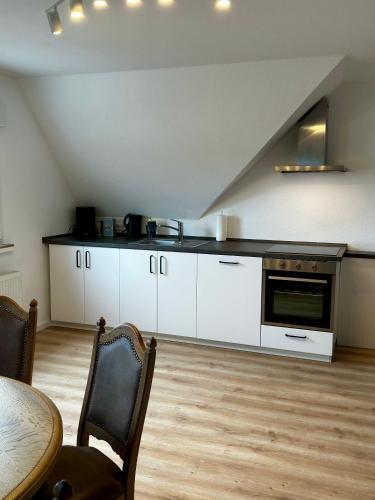 مطبخ, ERSTAY - moderne Zimmer in دورستين مطبخ, ERSTAY - moderne Zimmer in دورستين