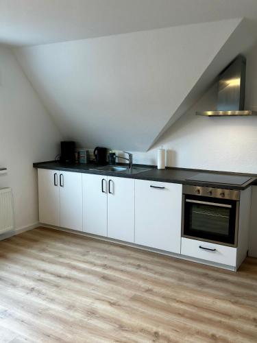 مطبخ, ERSTAY - moderne Zimmer in دورستين مطبخ, ERSTAY - moderne Zimmer in دورستين