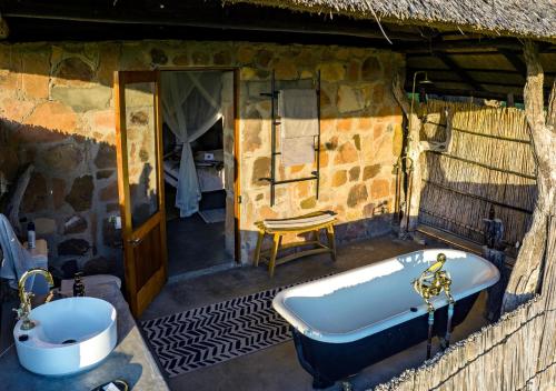 Ванная комната, Hideaways Bumbusi Wilderness Camp, Hwange in Хванге Ванная комната, Hideaways Bumbusi Wilderness Camp, Hwange in Хванге