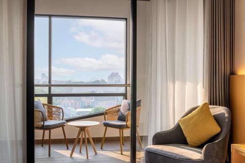 ระเบียง/ชานเรือน, Doubletree by Hilton Vientiane in ใกล้แม่น้ำ ระเบียง/ชานเรือน, Doubletree by Hilton Vientiane in ใกล้แม่น้ำ