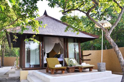 Balcony/terrace, NusaBay Menjangan Resort by WHM in Menjangan Balcony/terrace, NusaBay Menjangan Resort by WHM in Menjangan