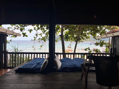 Balkon/Terrasse, Ohlala Guesthouse in Perhentian-Inseln Balkon/Terrasse, Ohlala Guesthouse in Perhentian-Inseln