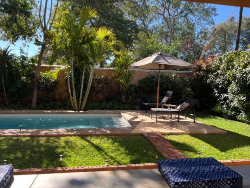 Úszómedence, Tabokana House near Victoria Falls repülőtér Úszómedence, Tabokana House near Victoria Falls repülőtér