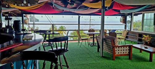 Restaurant, Las Cuevas Beach Lodge in Saint Augustine Restaurant, Las Cuevas Beach Lodge in Saint Augustine