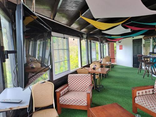 Restaurant, Las Cuevas Beach Lodge in Saint Augustine Restaurant, Las Cuevas Beach Lodge in Saint Augustine