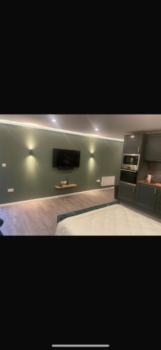 Woodland lodge green room in دونجيفين Woodland lodge green room in دونجيفين