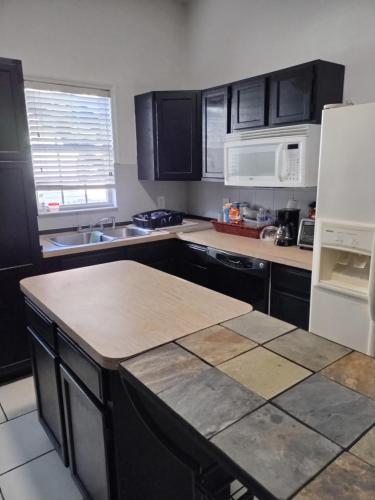 Küche, Palm Villa Hostel in Tampa (FL) Küche, Palm Villa Hostel in Tampa (FL)