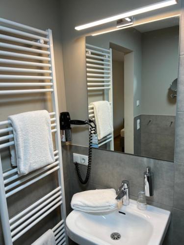 Fürdőszoba, VILSER Gästehaus (VILSER Gastehaus) in Bruchhausen-Vilsen Fürdőszoba, VILSER Gästehaus (VILSER Gastehaus) in Bruchhausen-Vilsen