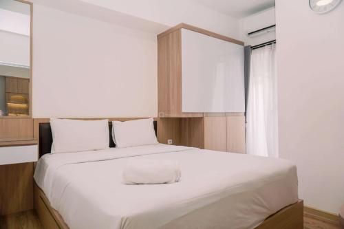 Modern Look 2BR Apartment M-Town Residence By Travelio